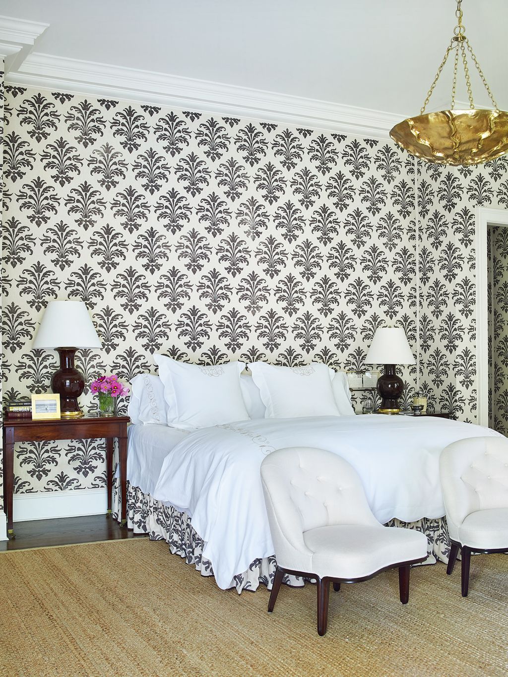 Image may contain Indoors Room Bedroom Furniture Chair Lamp Table Lamp and Dorm Room