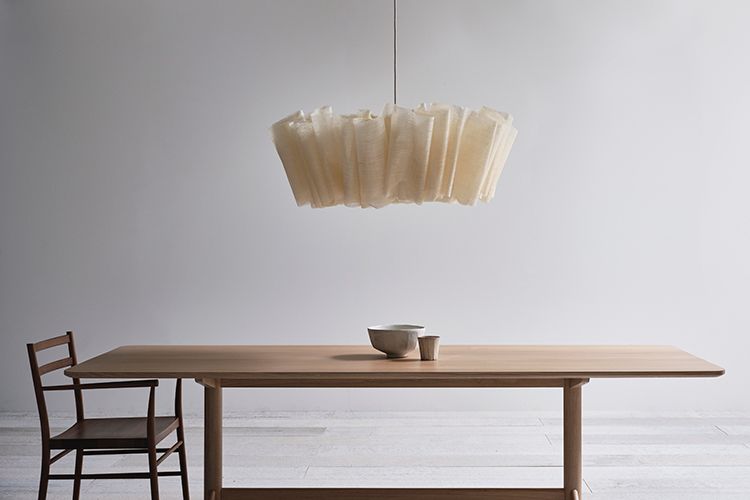 Image may contain Furniture Chair Tabletop Table Coffee Table Wood and Dining Table