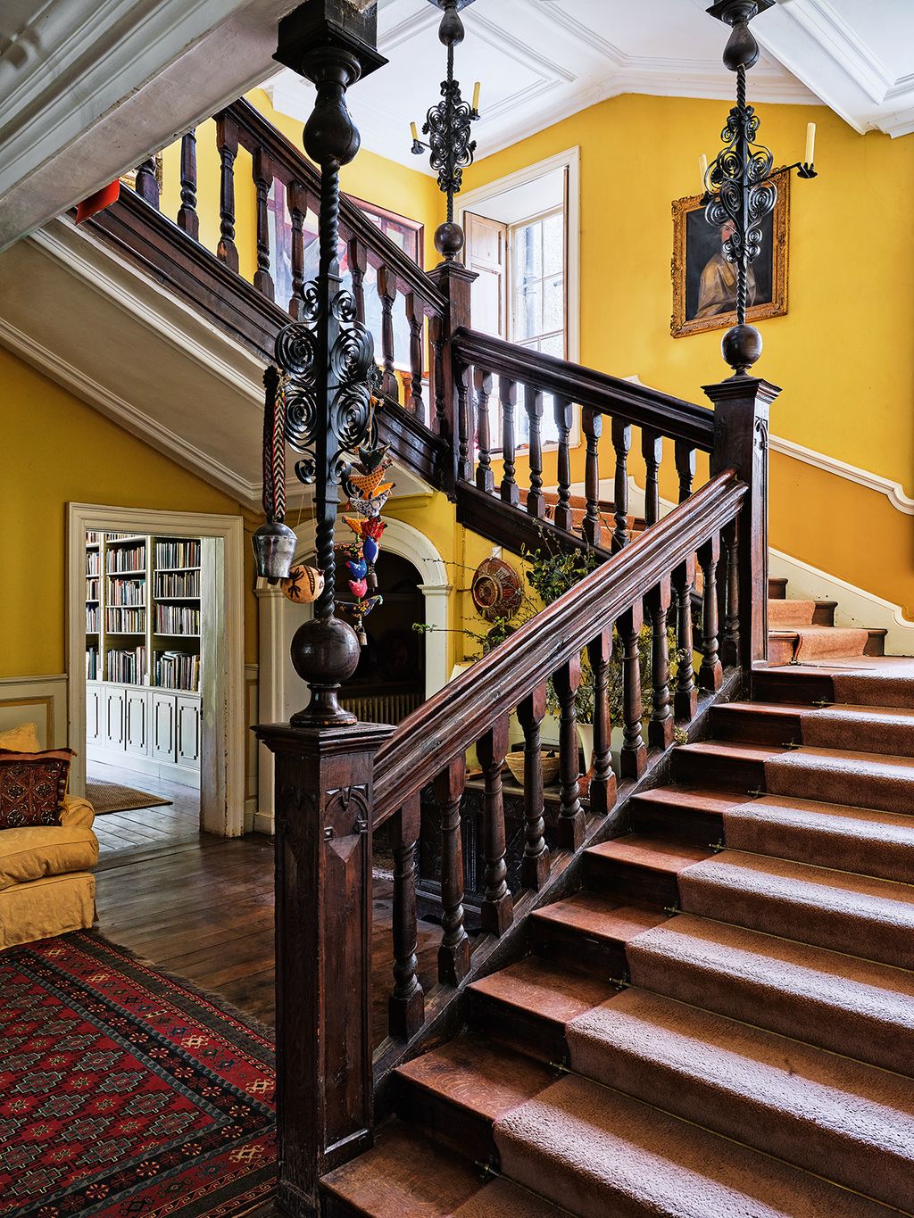 Image may contain Banister Handrail Flooring Hardwood Wood Staircase Floor Railing Interior Design and Indoors