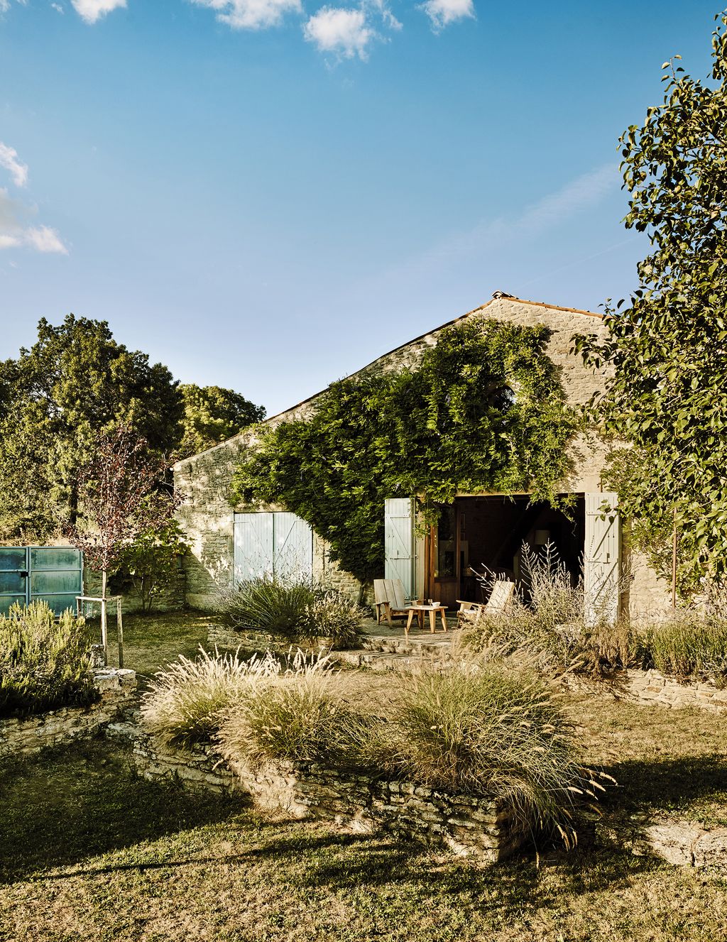 Image may contain Cottage Housing House Building Outdoors Nature Villa Bush Vegetation Plant and Countryside