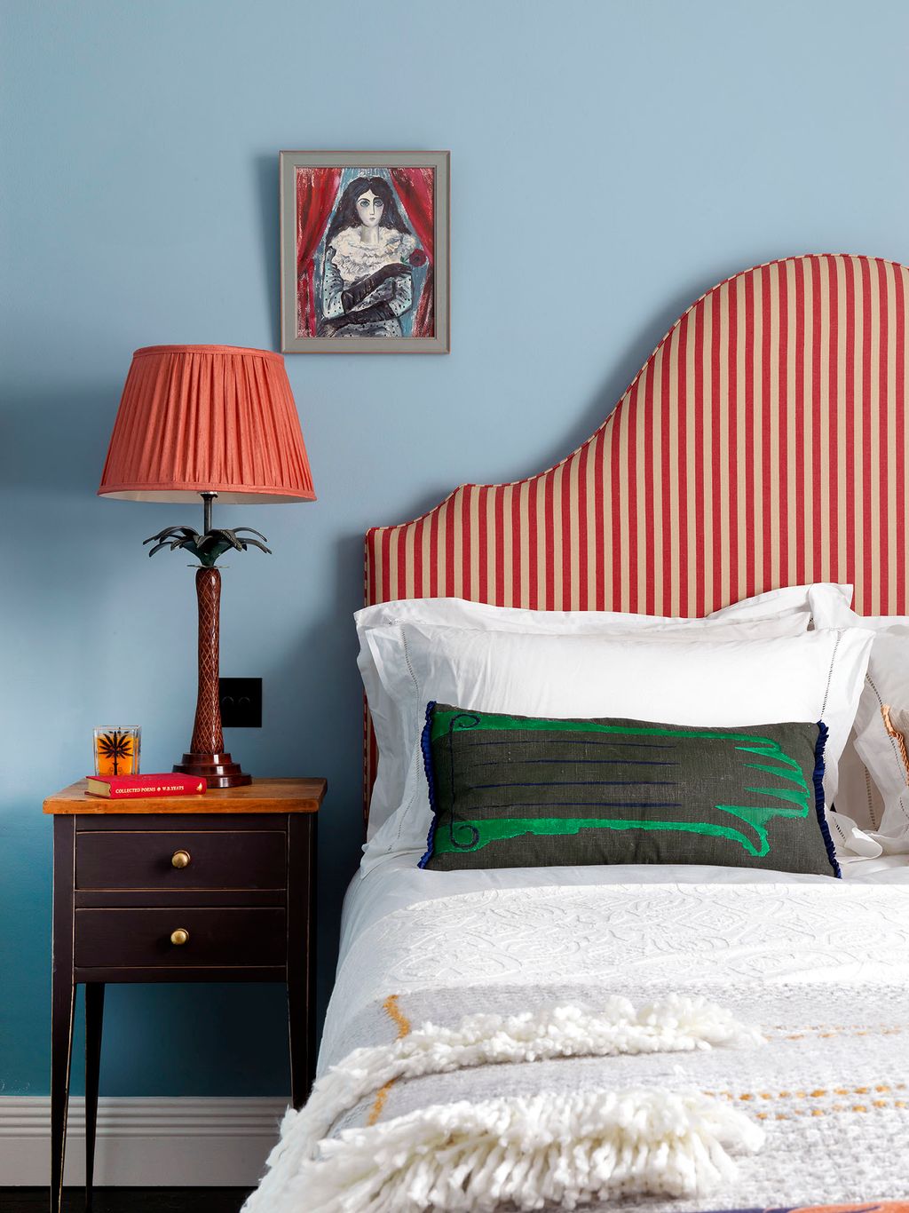 Image may contain Lamp Furniture Table Lamp Indoors Room Bedroom Interior Design and Bed