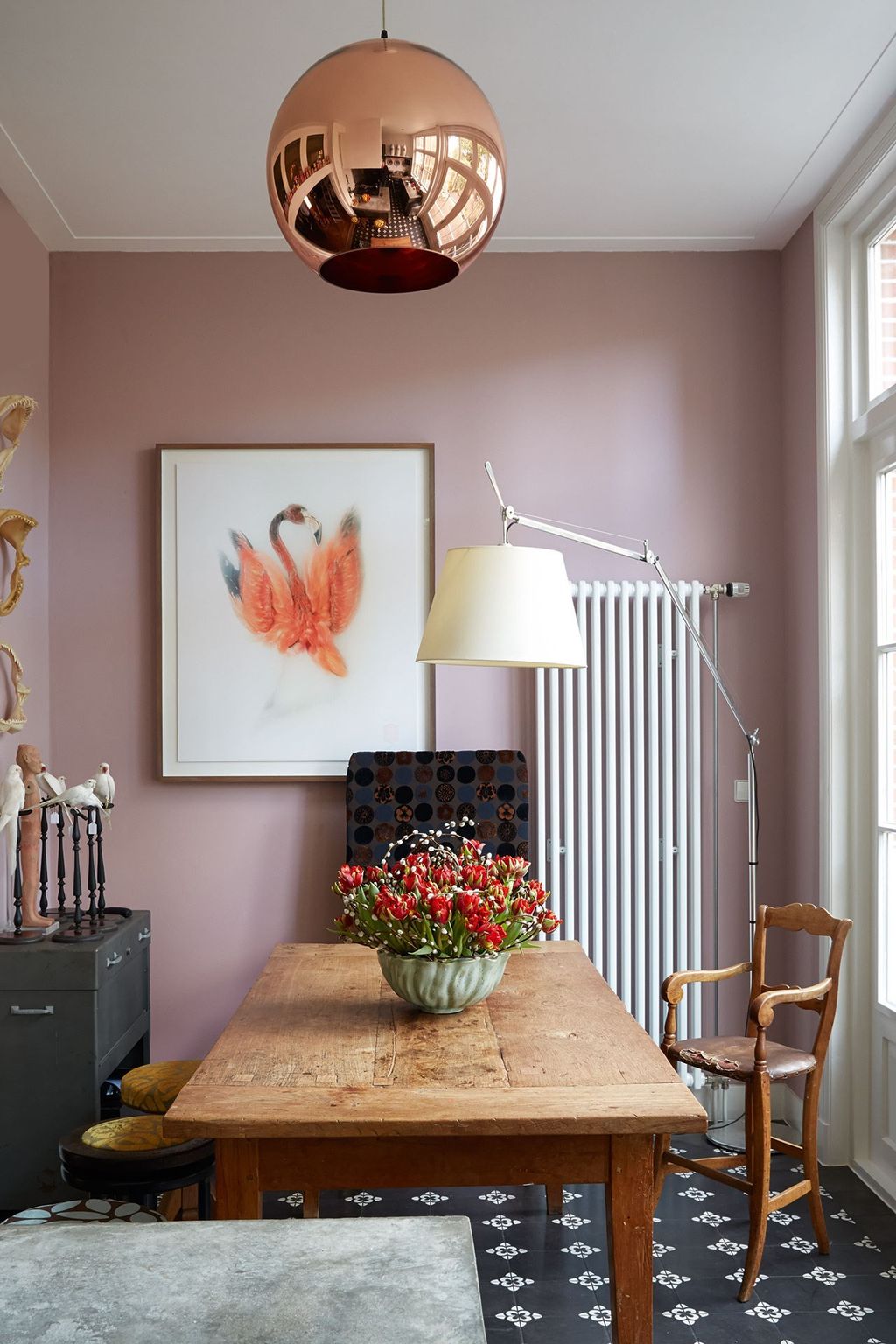 A 'Copper Round' light by Tom Dixon hangs above the kitchen table.  Like this Then you'll love  A tour of our legendary...