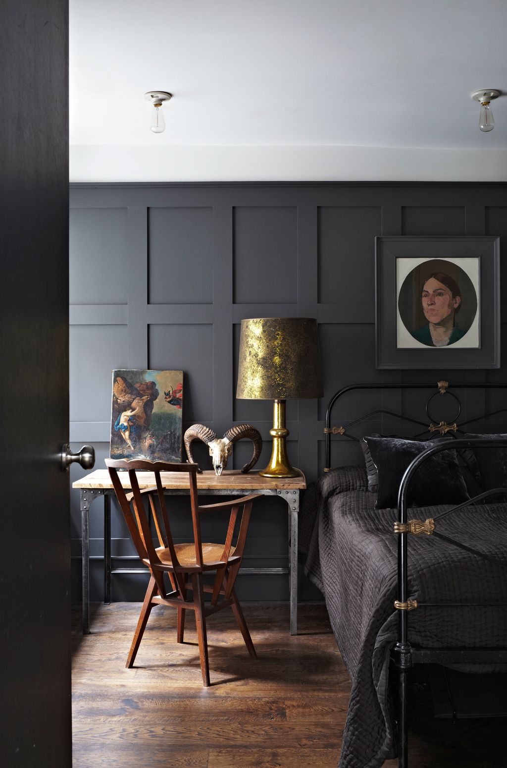 Image may contain Furniture Chair Living Room Room Indoors Human Person Lamp Table Lamp Couch and Interior Design