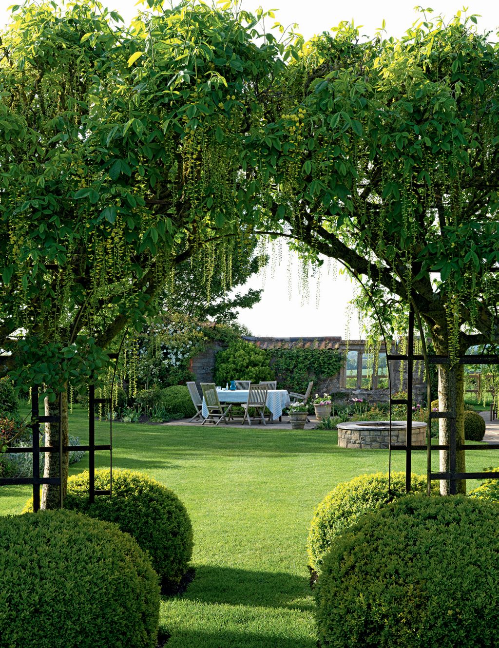 Image may contain Plant Grass Outdoors Lawn Garden Park and Arbour