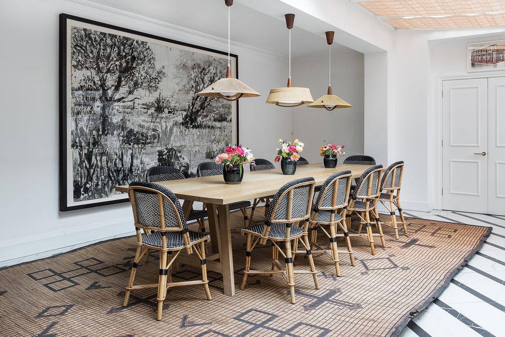 Image may contain Furniture Chair Indoors Room Restaurant Dining Table Table Flooring and Interior Design