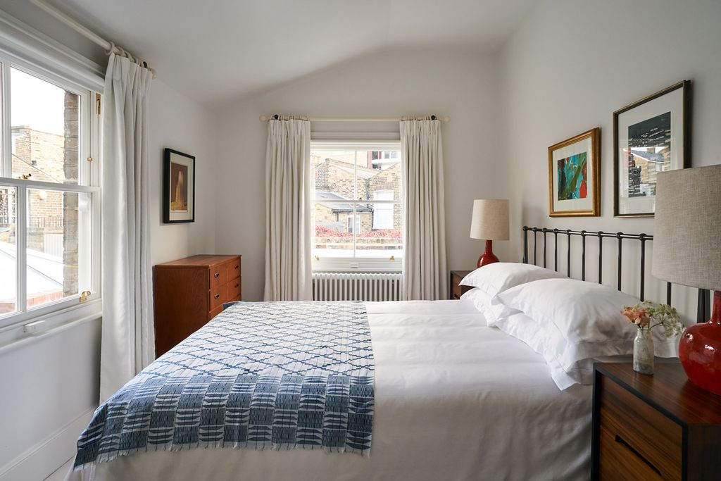 Image may contain Furniture Indoors Room Bedroom and Bed