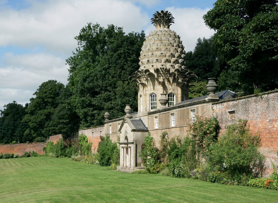 Image may contain Plant Grass Lawn Building Architecture Dome Steeple Spire and Tower