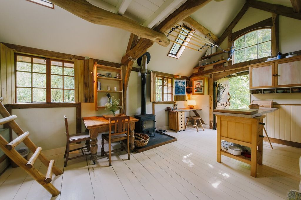 Image may contain Wood Flooring Housing Building Furniture Chair Hardwood Floor Loft Indoors Living Room and Room