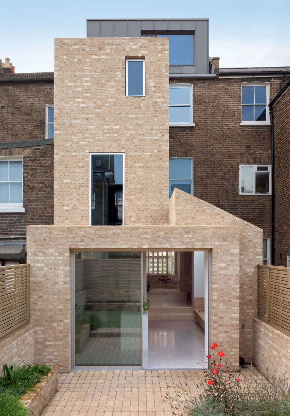 Image may contain Door Floor Brick Building and Flooring