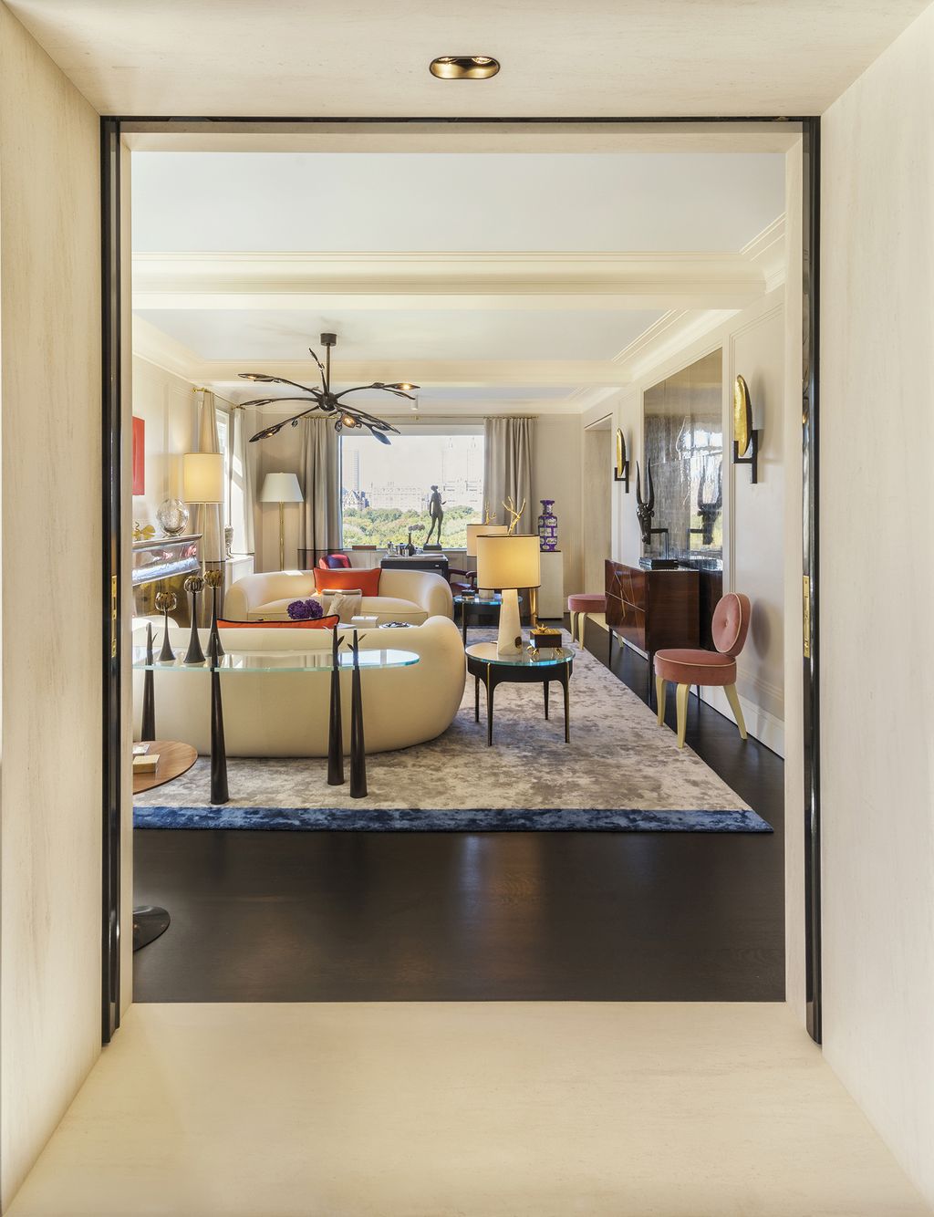 Image may contain Flooring Interior Design Indoors Living Room Room Door Floor Furniture and Home Decor