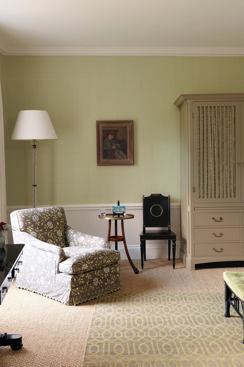 Image may contain Furniture Living Room Indoors Room Home Decor Table and Rug