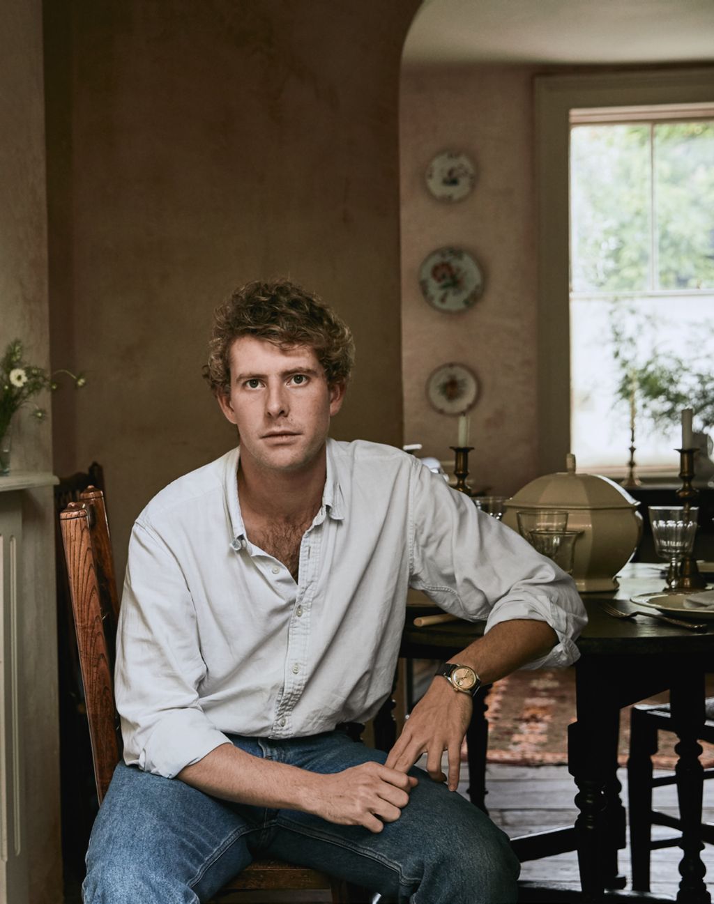 Image may contain Human Person Wood Flooring Plywood Clothing Apparel Hardwood Furniture and Home Decor