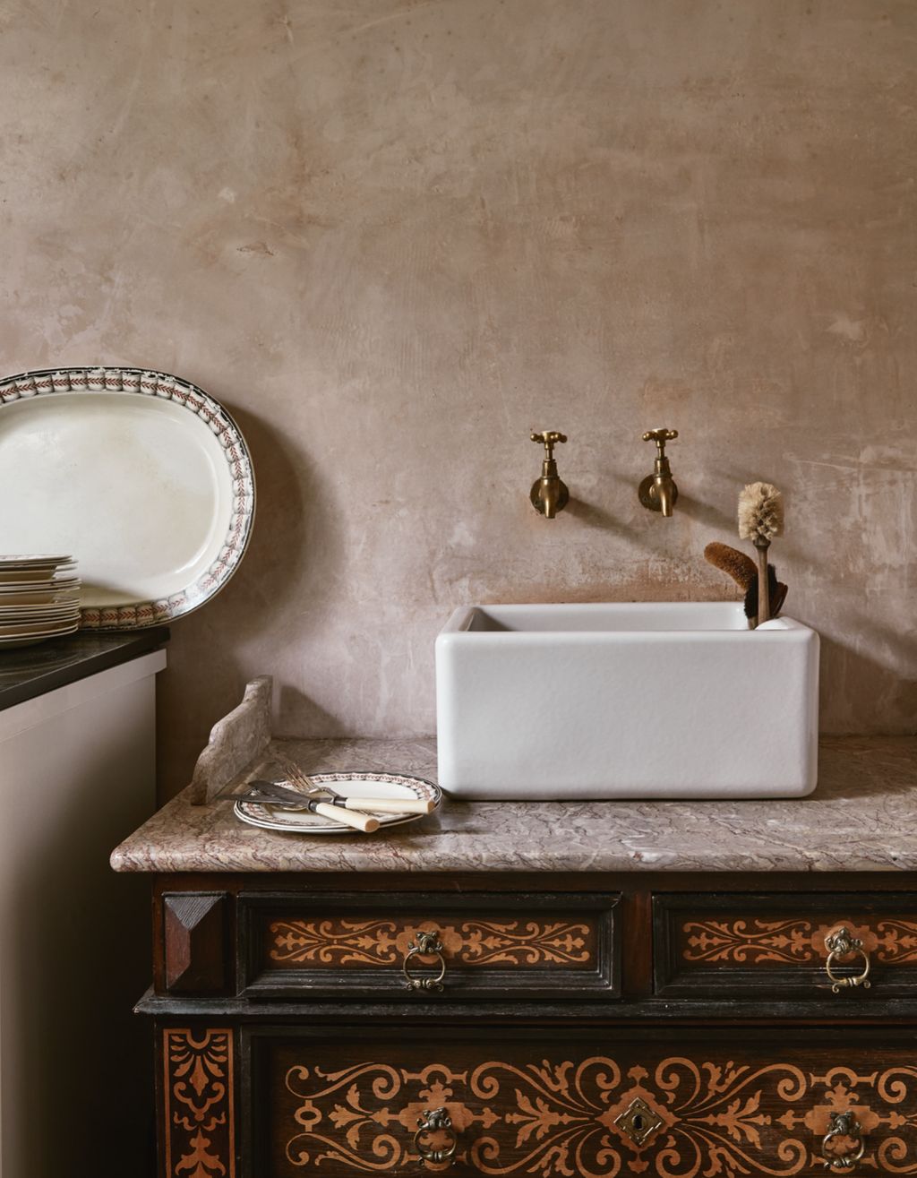 Image may contain Sink Faucet and Sink