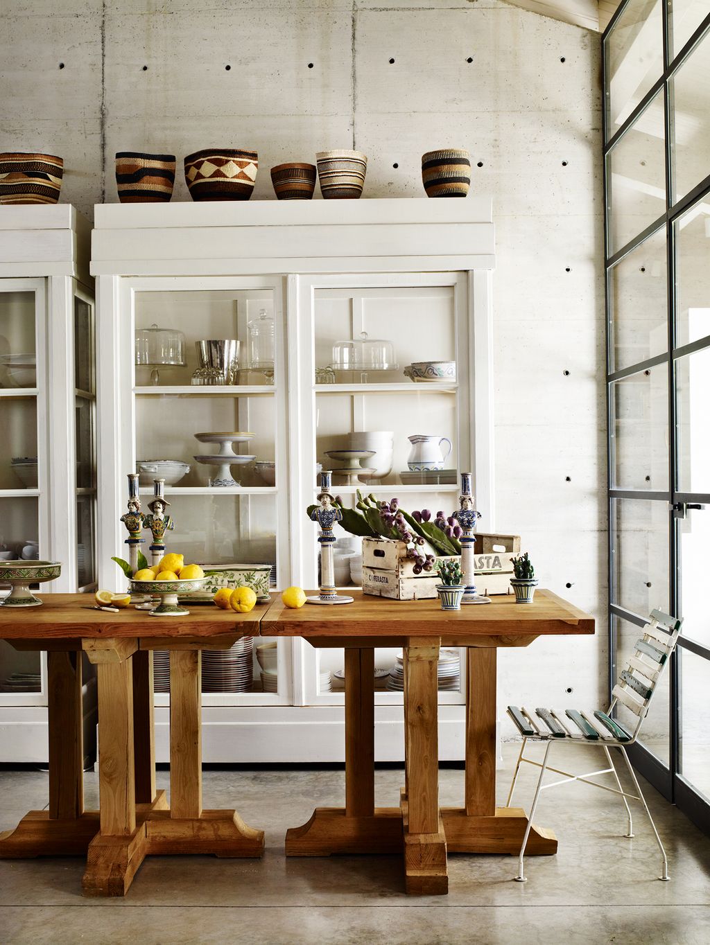 Image may contain Furniture Room Indoors Shelf Interior Design Dining Room Kitchen Table and Dining Table