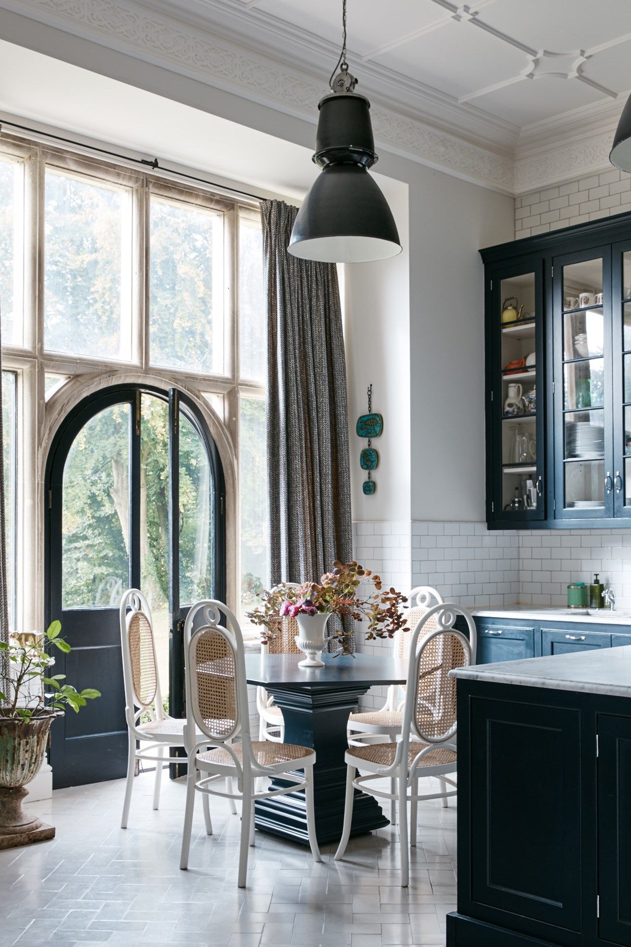 Henri worked with Holloways of Ludlow to design the marbletopped kitchen units painted in Farrow amp Ball's 'Railings'.