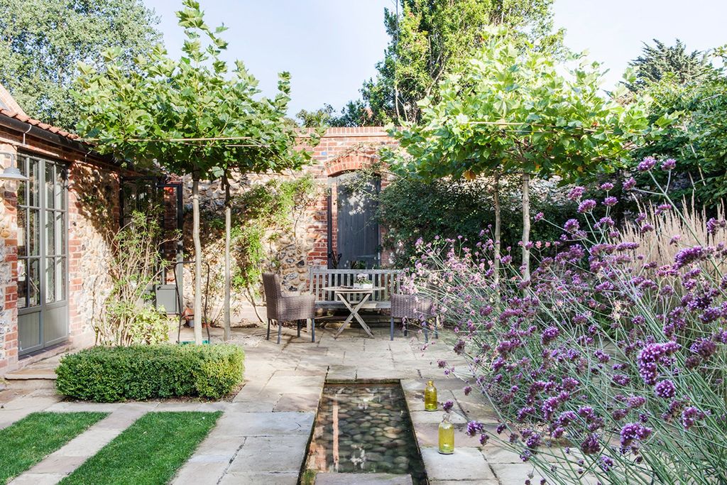 Garden  White Country Barn Conversion | Real Homes