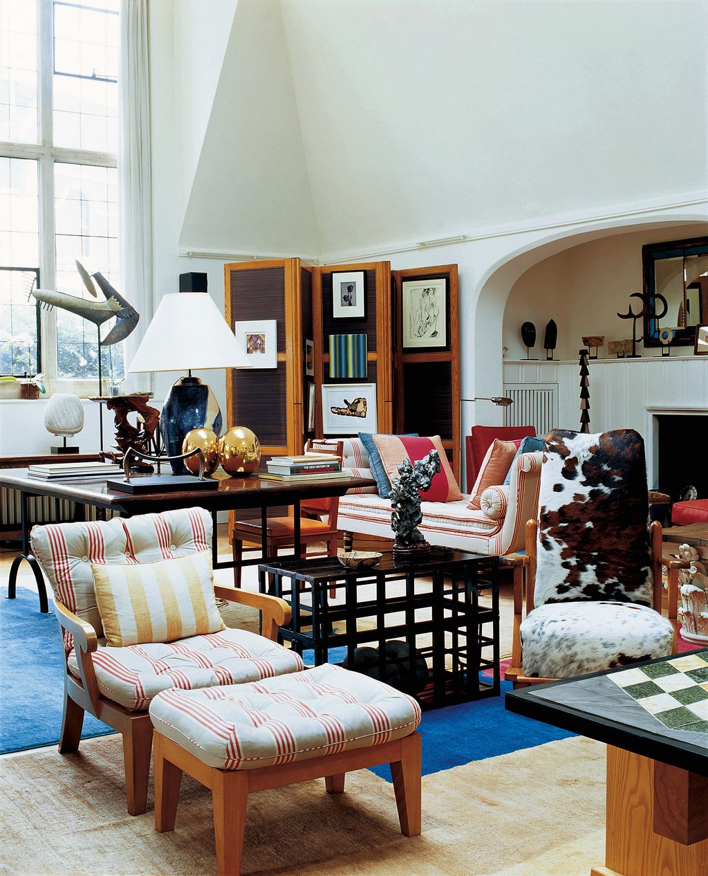 Image may contain Furniture Living Room Room Indoors Couch and Table