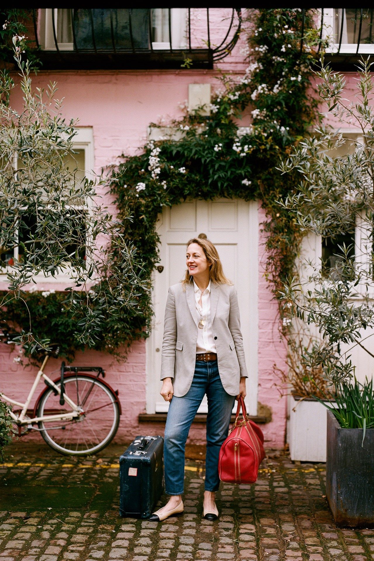 Image may contain Wheel Machine Bicycle Vehicle Transportation Bike Human Person Pants Clothing Jeans and Denim