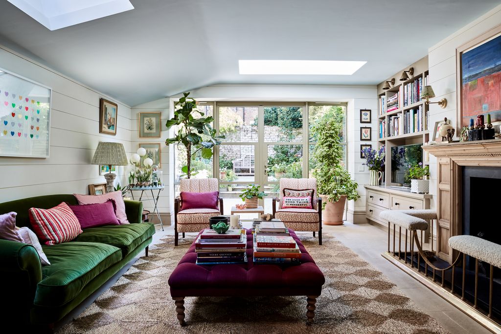 Image may contain Furniture Living Room Indoors Room Cushion Chair Pillow Interior Design Rug and Couch