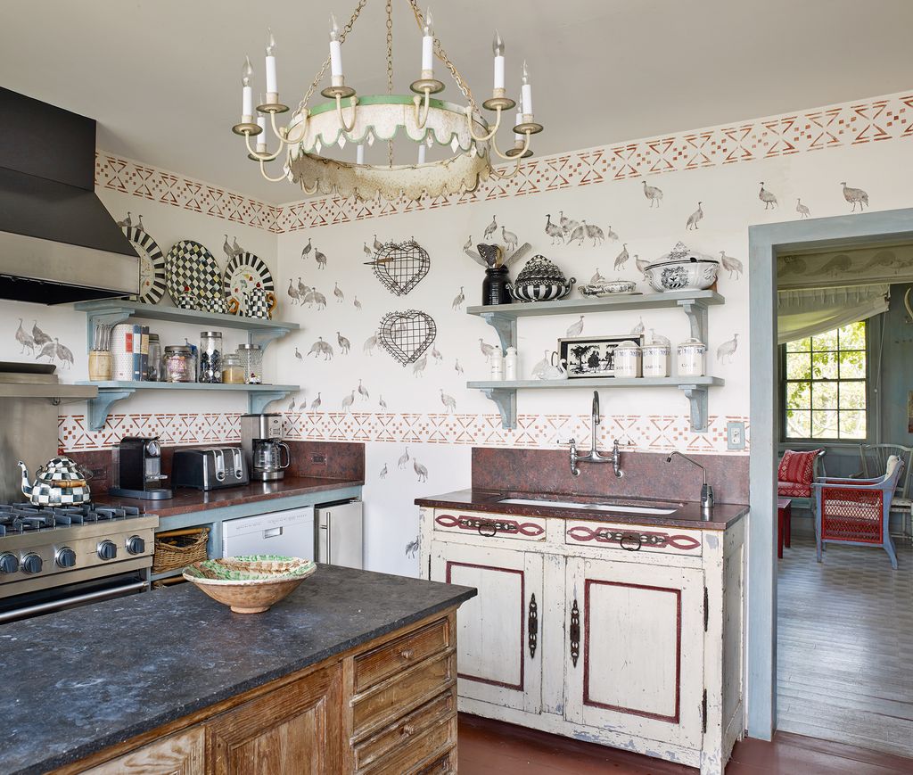 Image may contain Indoors Room Kitchen Interior Design Kitchen Island and Furniture