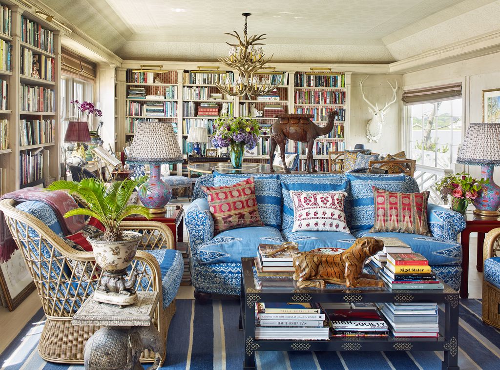 Image may contain Furniture Couch Living Room Room Indoors Chair and Cushion