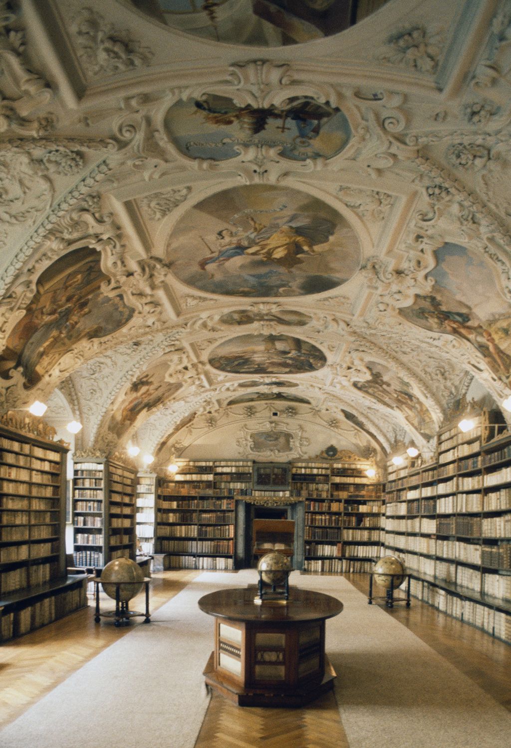 Image may contain Indoors Room Library Book and Furniture