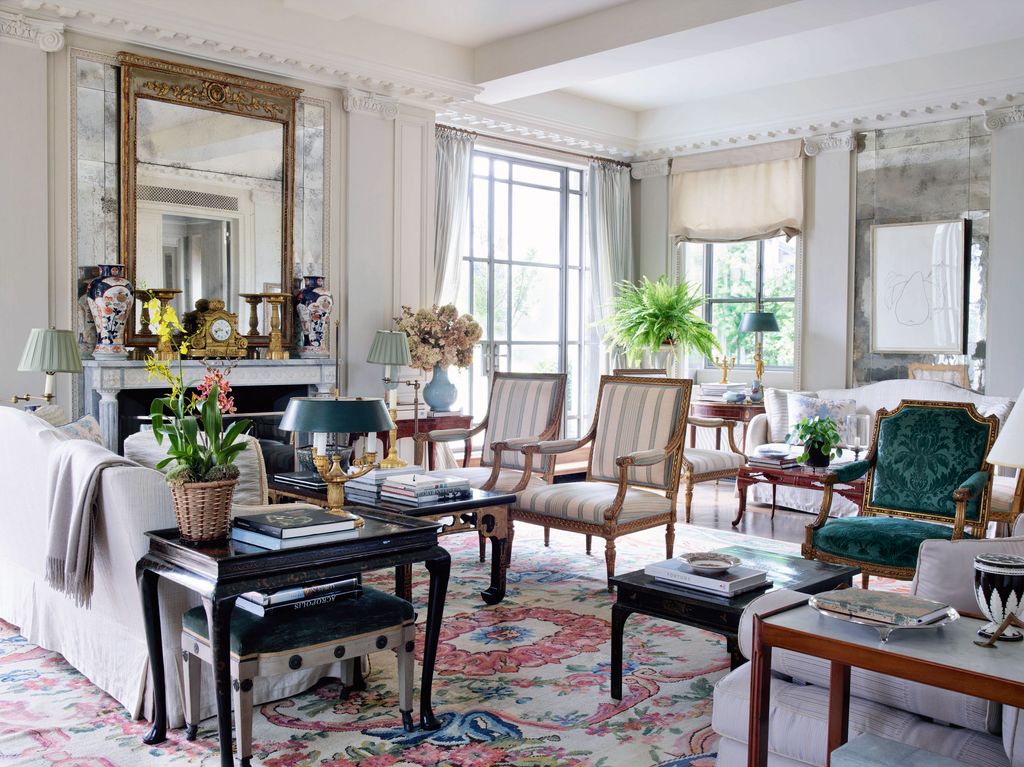 Image may contain Furniture Living Room Room Indoors Table Coffee Table and Chair