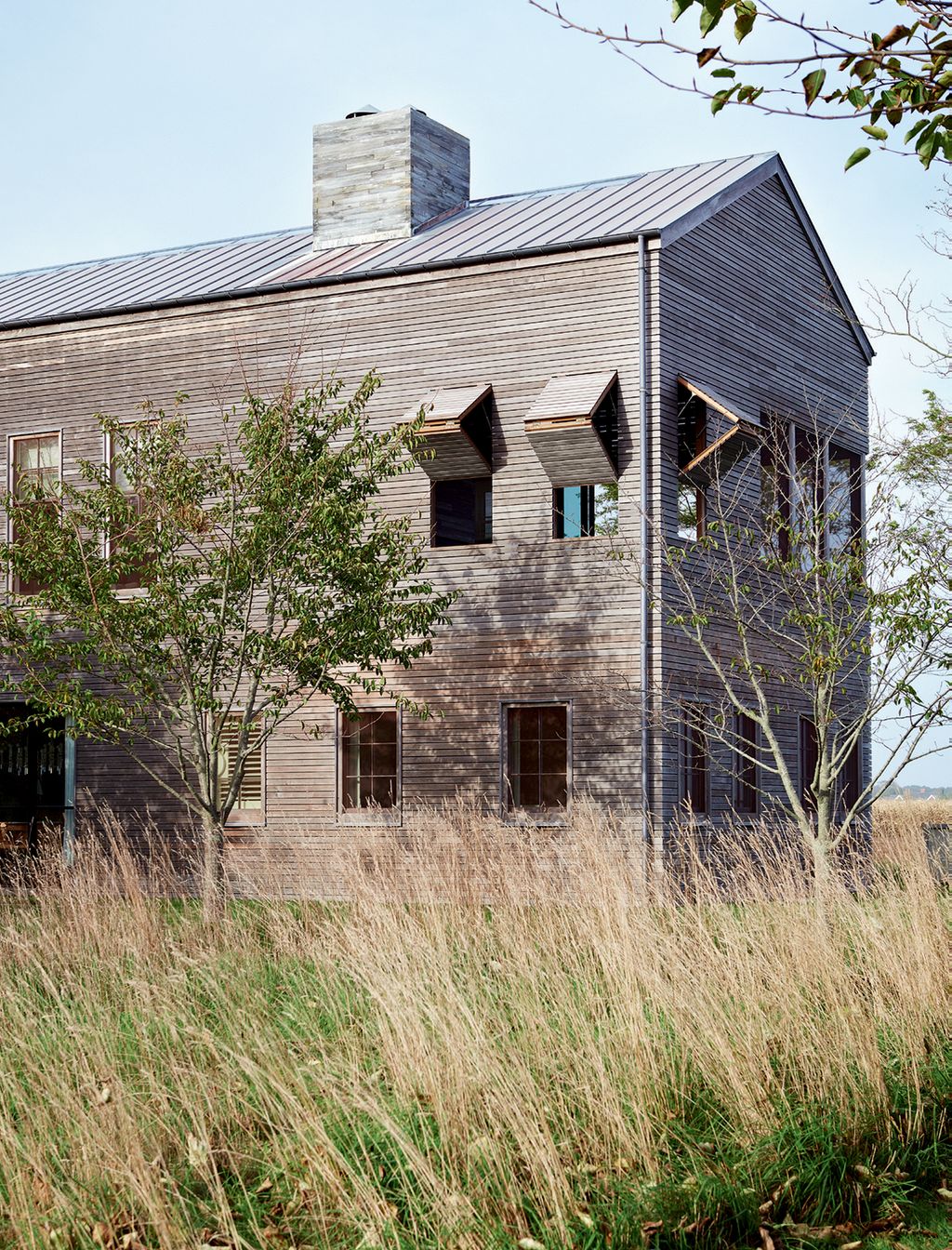 Image may contain Housing Building Nature Outdoors Cottage House Shelter Countryside Rural Grass and Plant