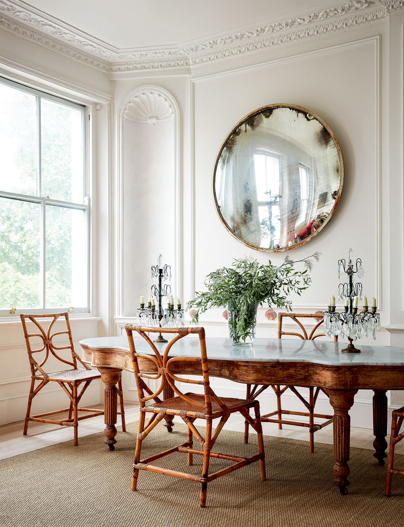 Image may contain Indoors Room Furniture Dining Room Chair Table and Dining Table