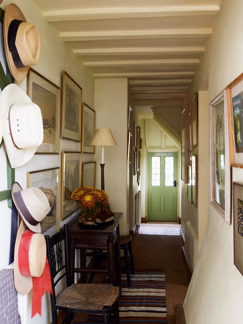 Image may contain Wood Flooring Floor Hardwood Interior Design Indoors Shelf Furniture and Chair