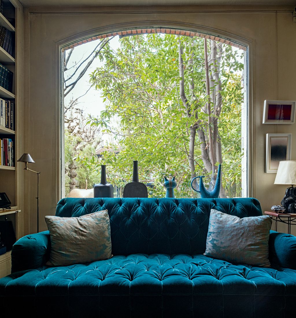 Image may contain Couch Furniture Living Room Indoors Room and Cushion