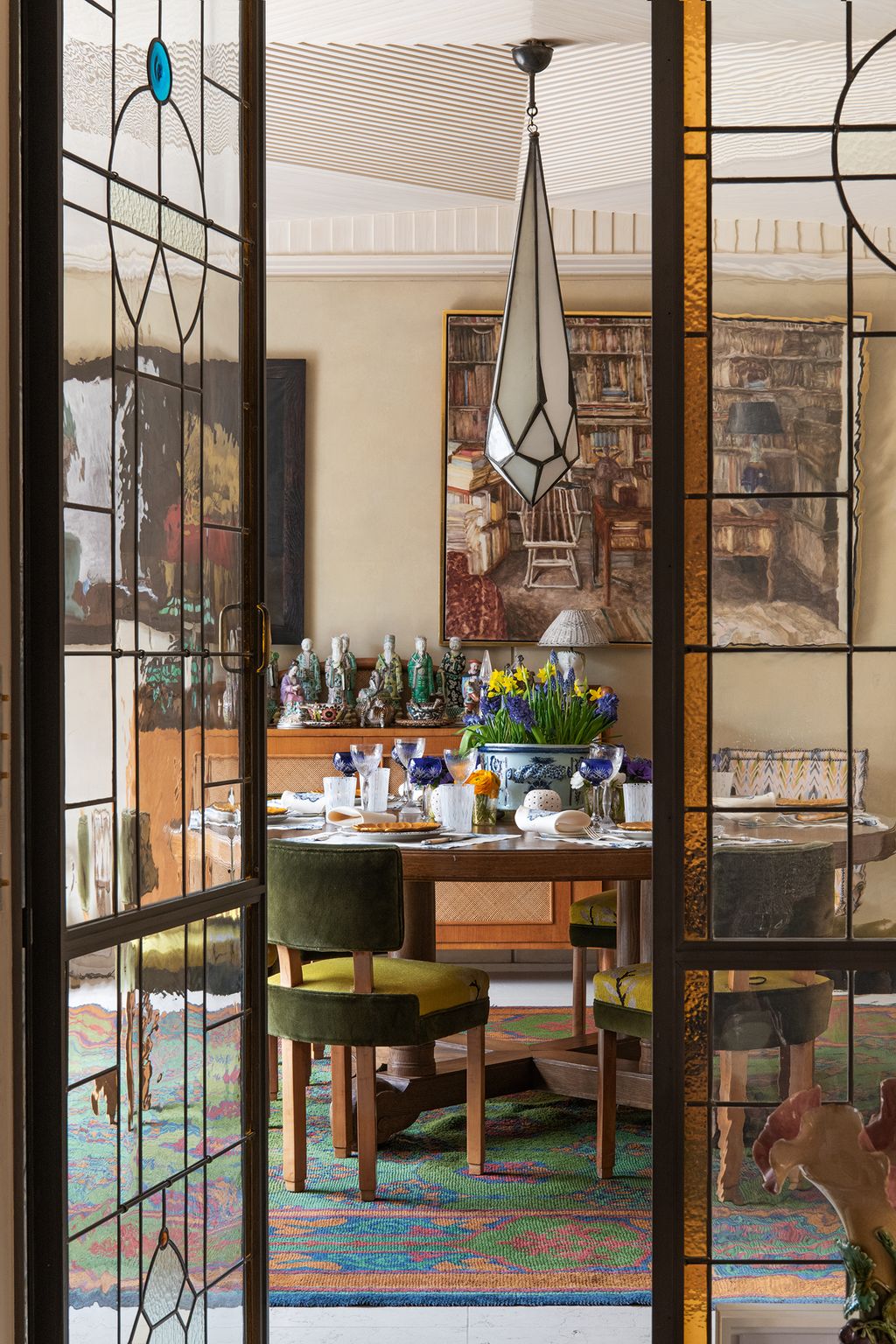 Image may contain Furniture Cabinet China Cabinet Interior Design Indoors Table Dining Table Rug and Shelf