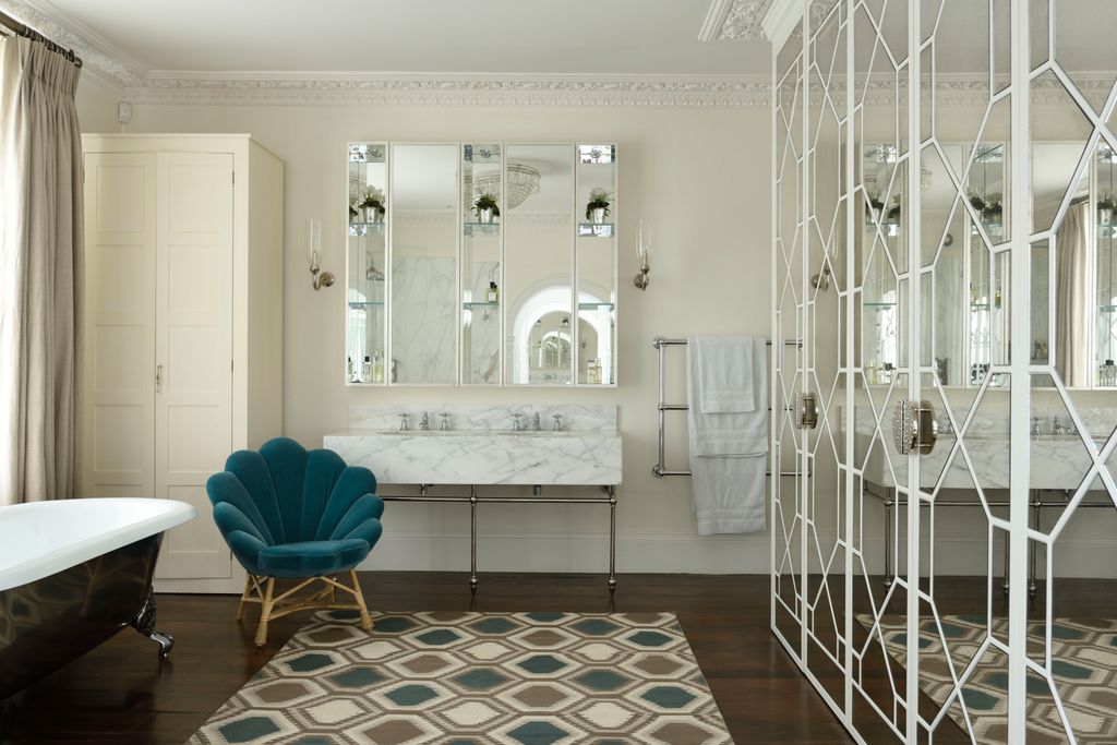 Image may contain Indoors Room Interior Design Rug and Furniture