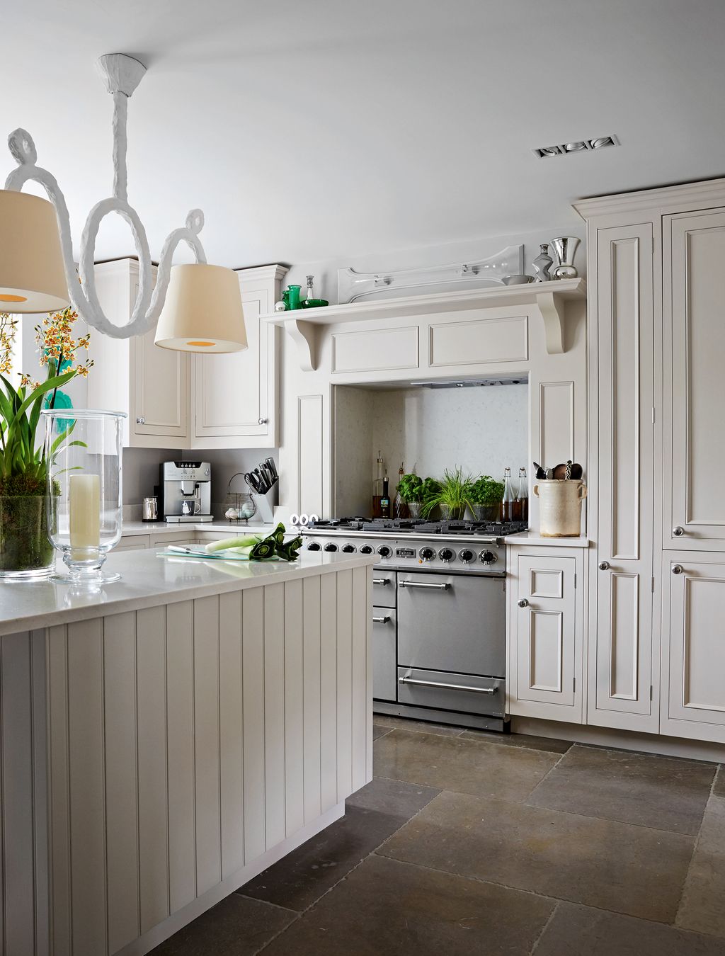 The kitchen has custom­made units and is open plan with the dining area.