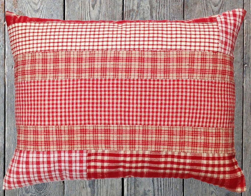 Image may contain Cushion Pillow Tablecloth and Rug