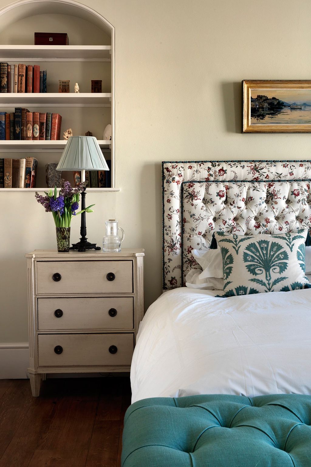 Nicole Fabre Designs ‘Laure fabric was used for the curtains and headboard in this bedroom in a London garden square...