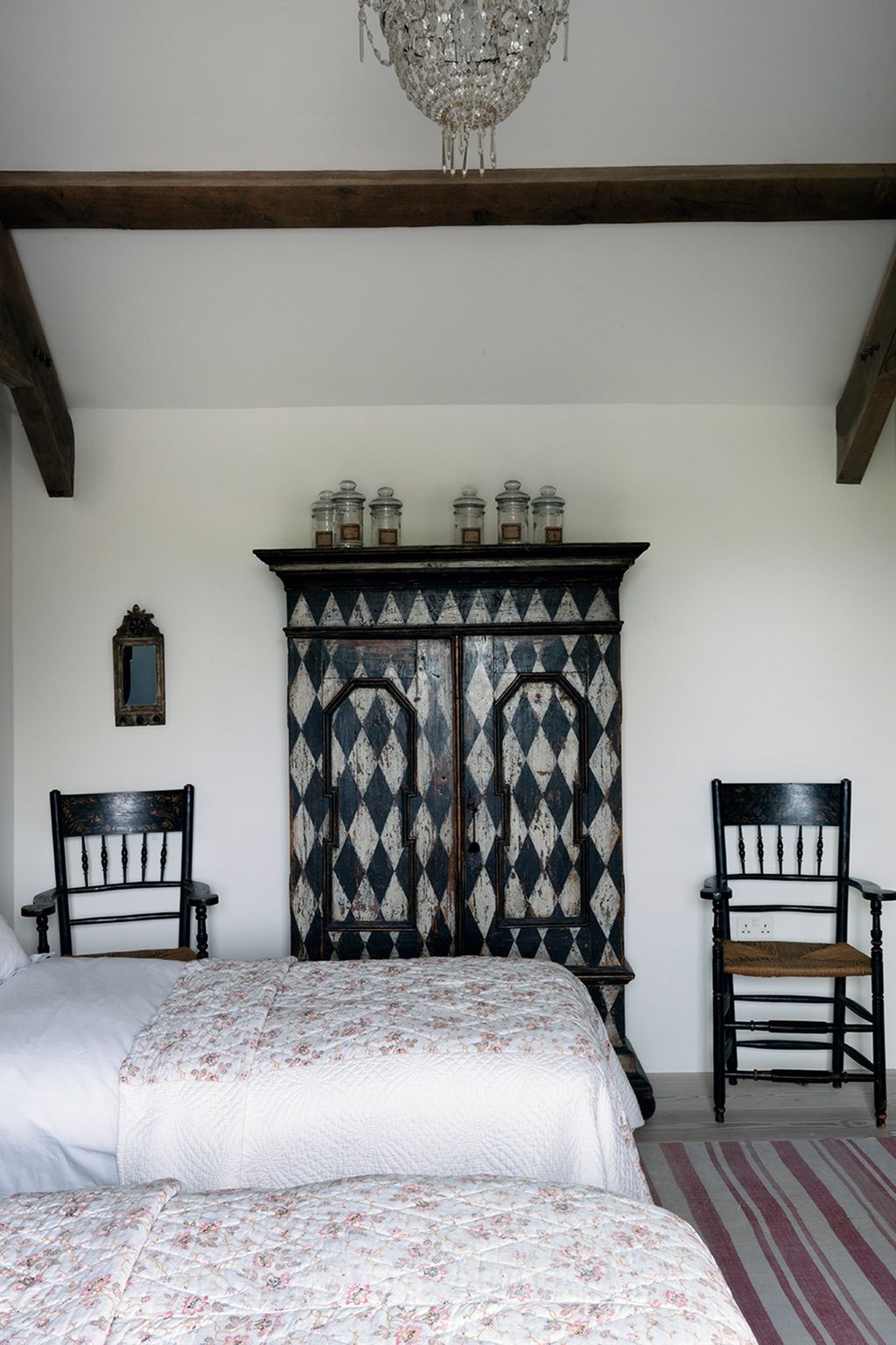 Image may contain Furniture Room Bedroom Indoors Interior Design Bed Chair and Shelf