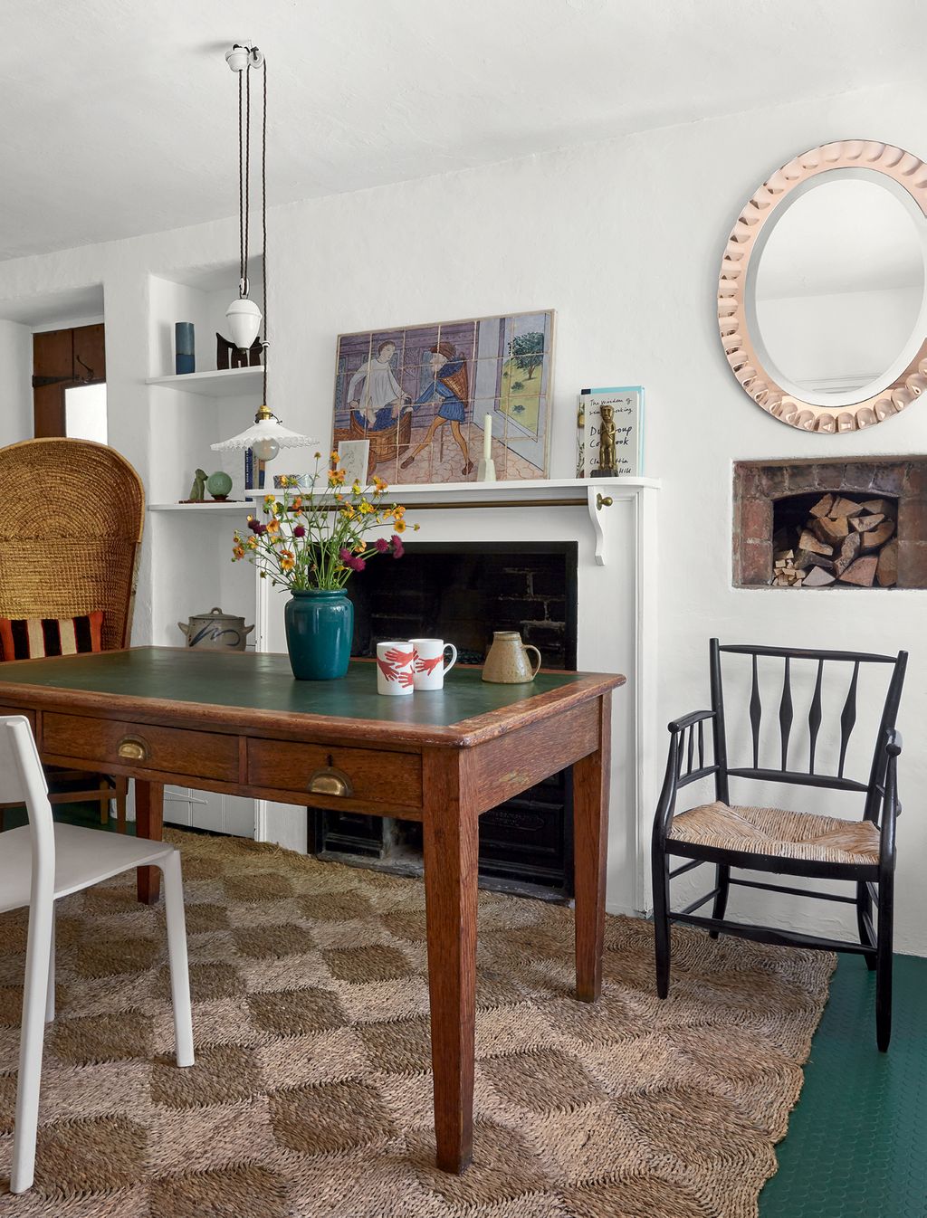 Image may contain Furniture Indoors Interior Design Table Chair Living Room Room Tabletop Flooring Plant and Wood