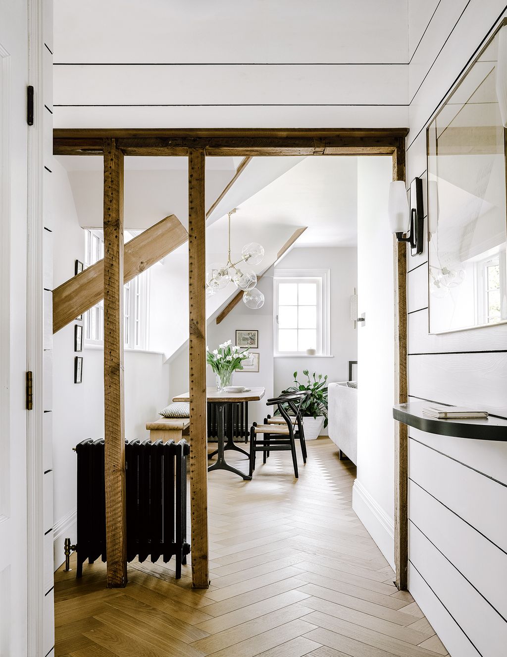 Image may contain Interior Design Indoors Housing Building Door Flooring Floor Banister and Handrail