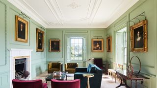 Image may contain Furniture Indoors Room Living Room Chair Lobby Couch Flooring and Waiting Room