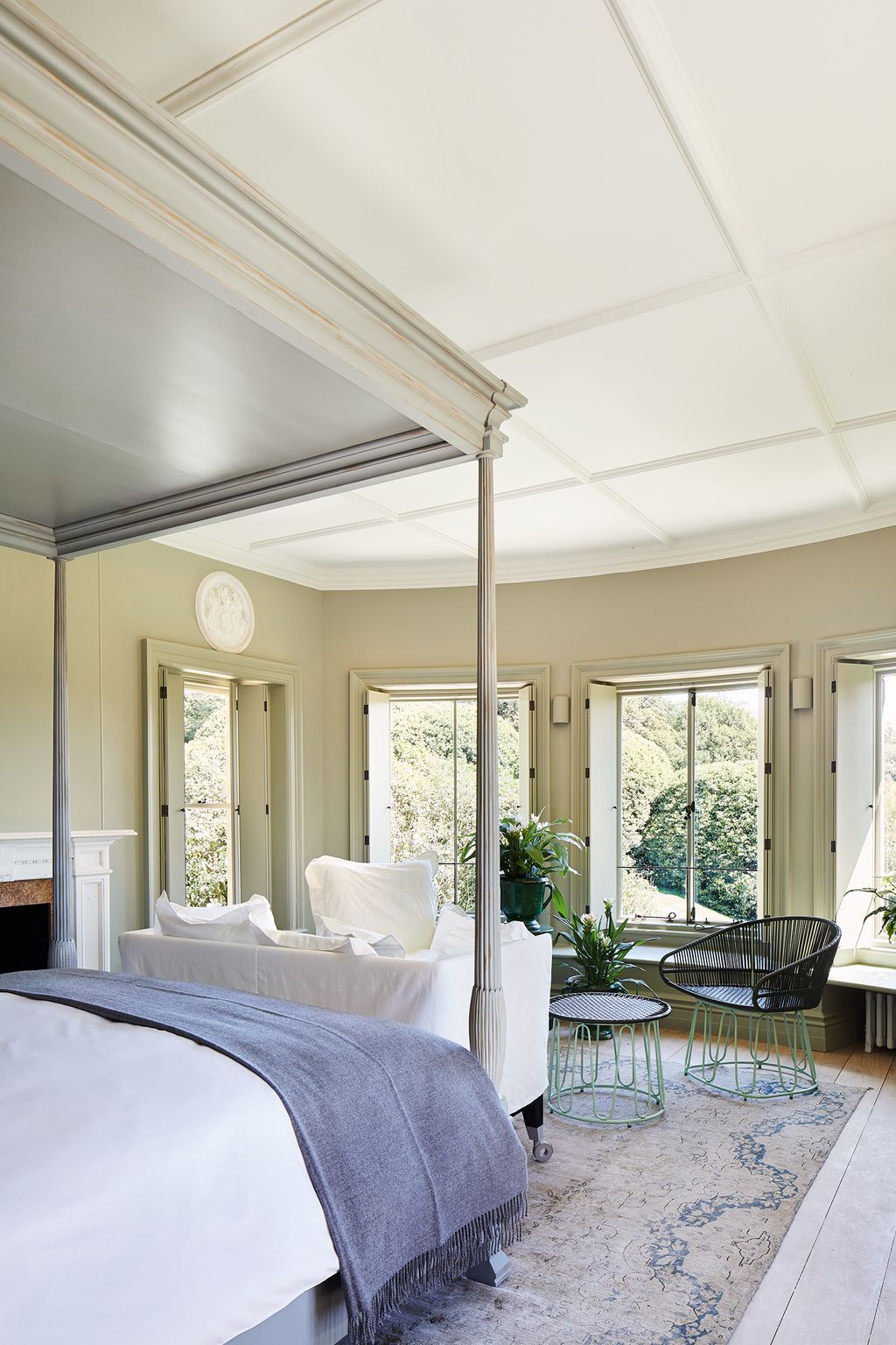 Image may contain Furniture Interior Design Indoors Room Bedroom Living Room Rug Cushion and Pillow