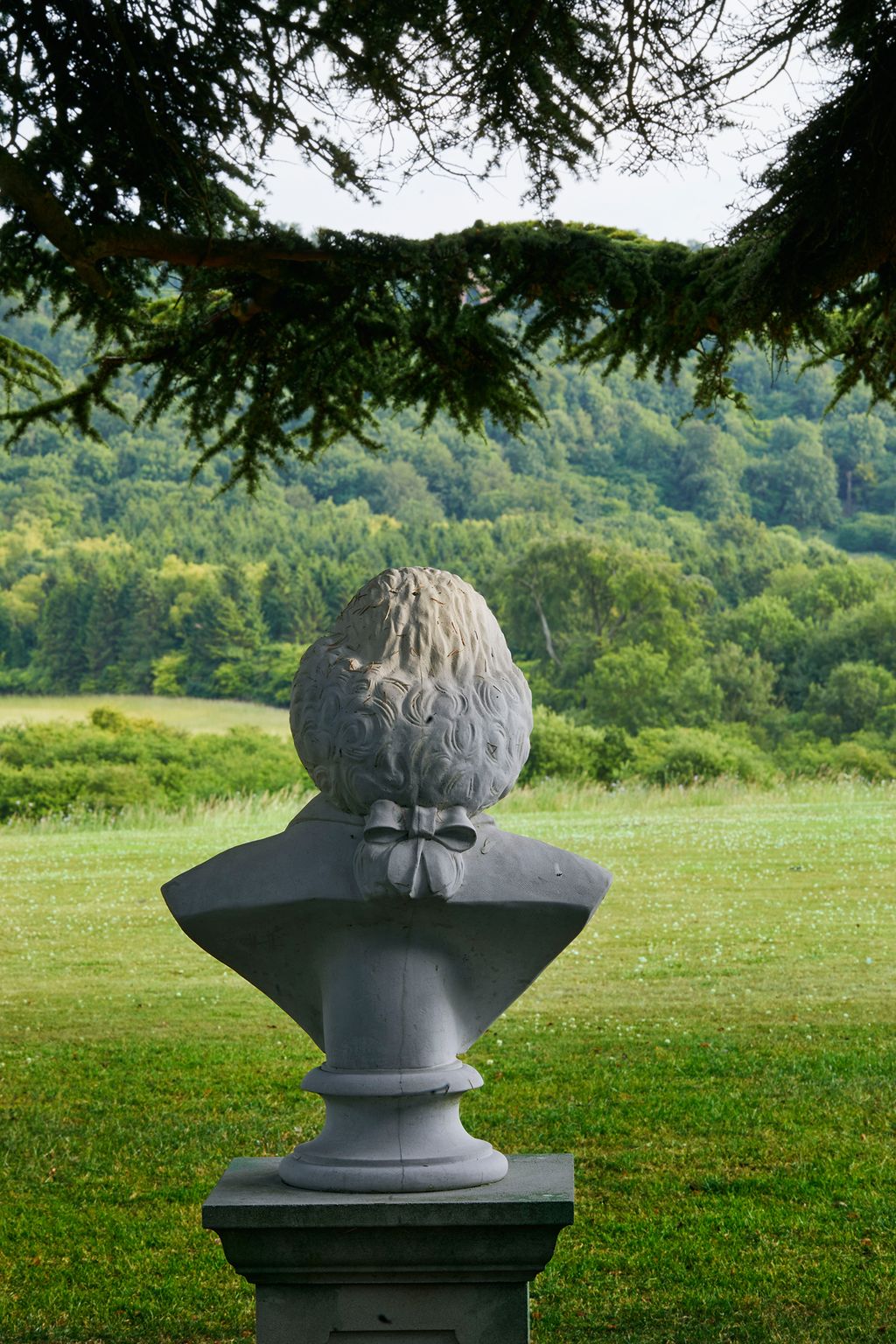 Image may contain Sphere Grass Plant Art Sculpture Animal Bird Hydrant Fire Hydrant Bush Vegetation and Statue