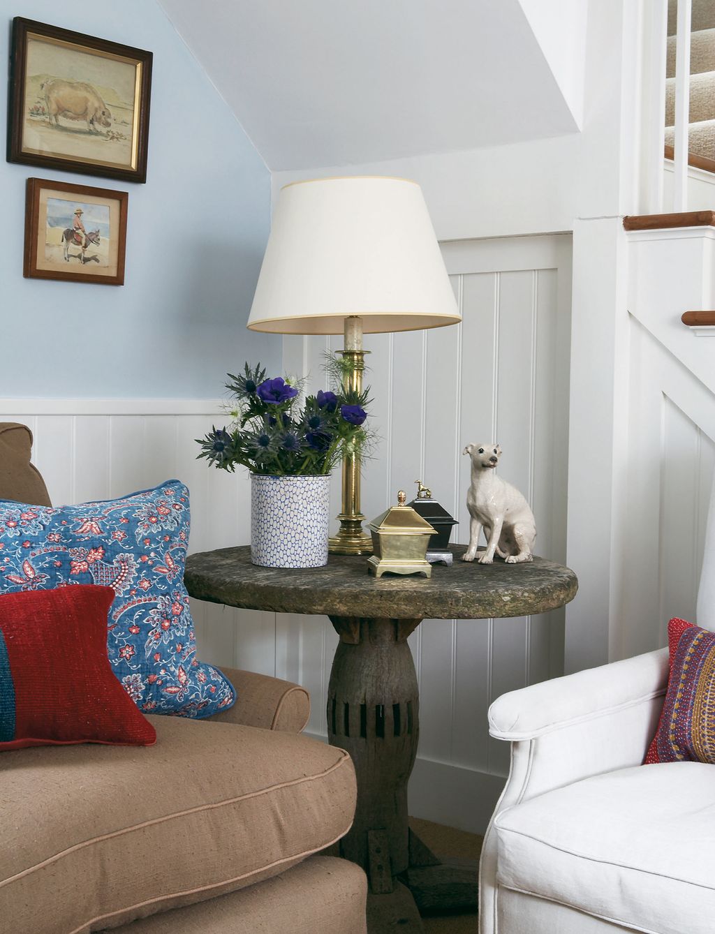 Image may contain Cushion Pillow Furniture Living Room Room Indoors Couch Interior Design Lamp and Table Lamp
