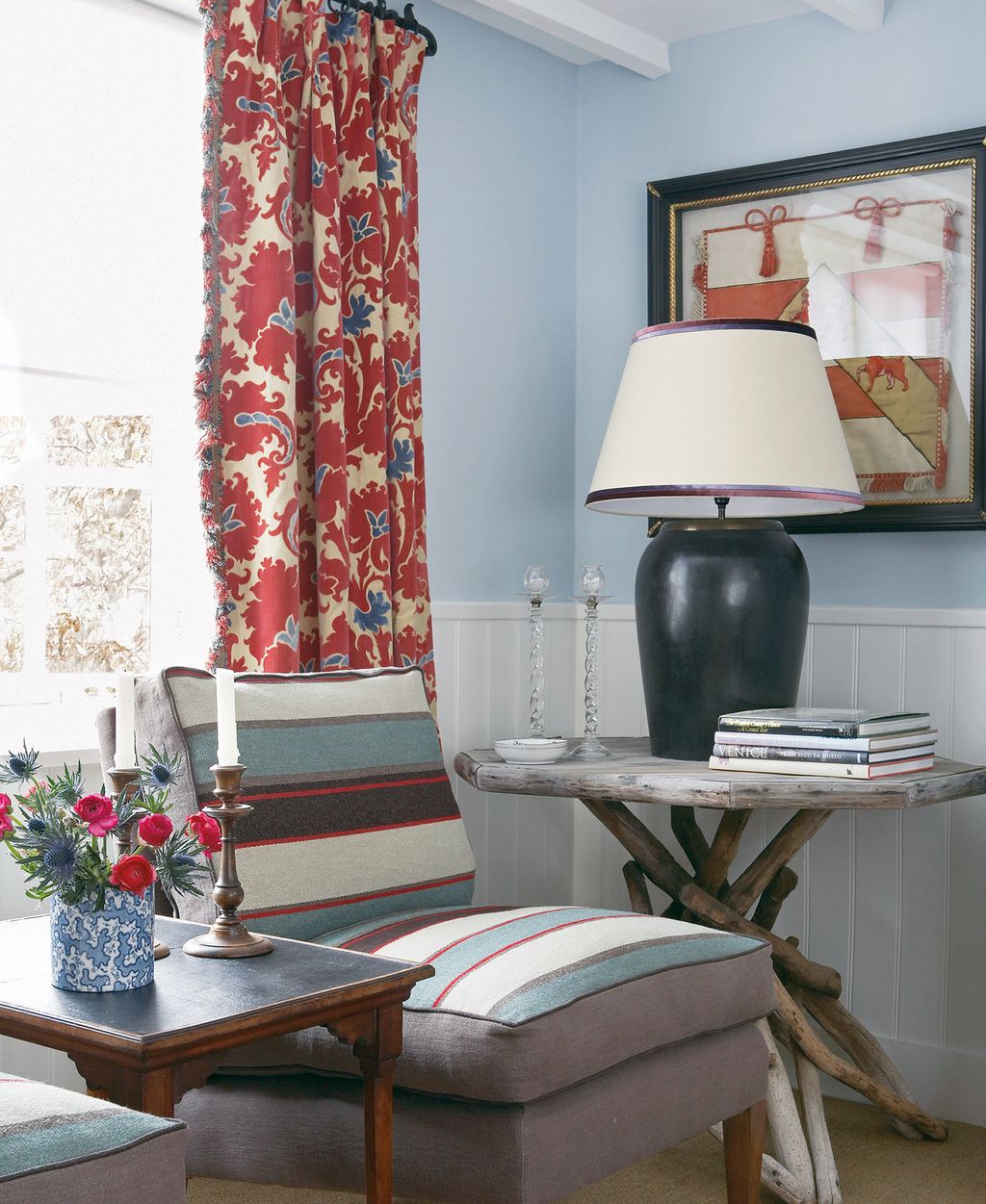 Image may contain Living Room Room Indoors Furniture Interior Design Lamp Table Lamp Couch Home Decor and Table