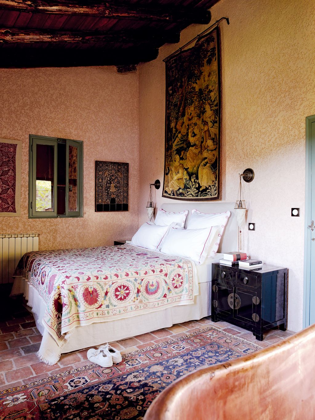 Image may contain Indoors Room Bedroom Furniture Bed Rug and Interior Design