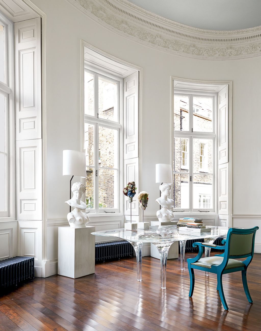 Image may contain Furniture Chair Flooring Interior Design Indoors Floor Table Housing Building and Living Room