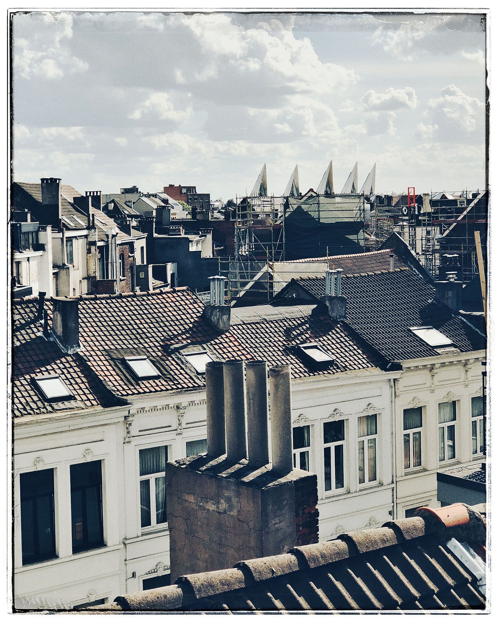 Image may contain Roof and Tile Roof