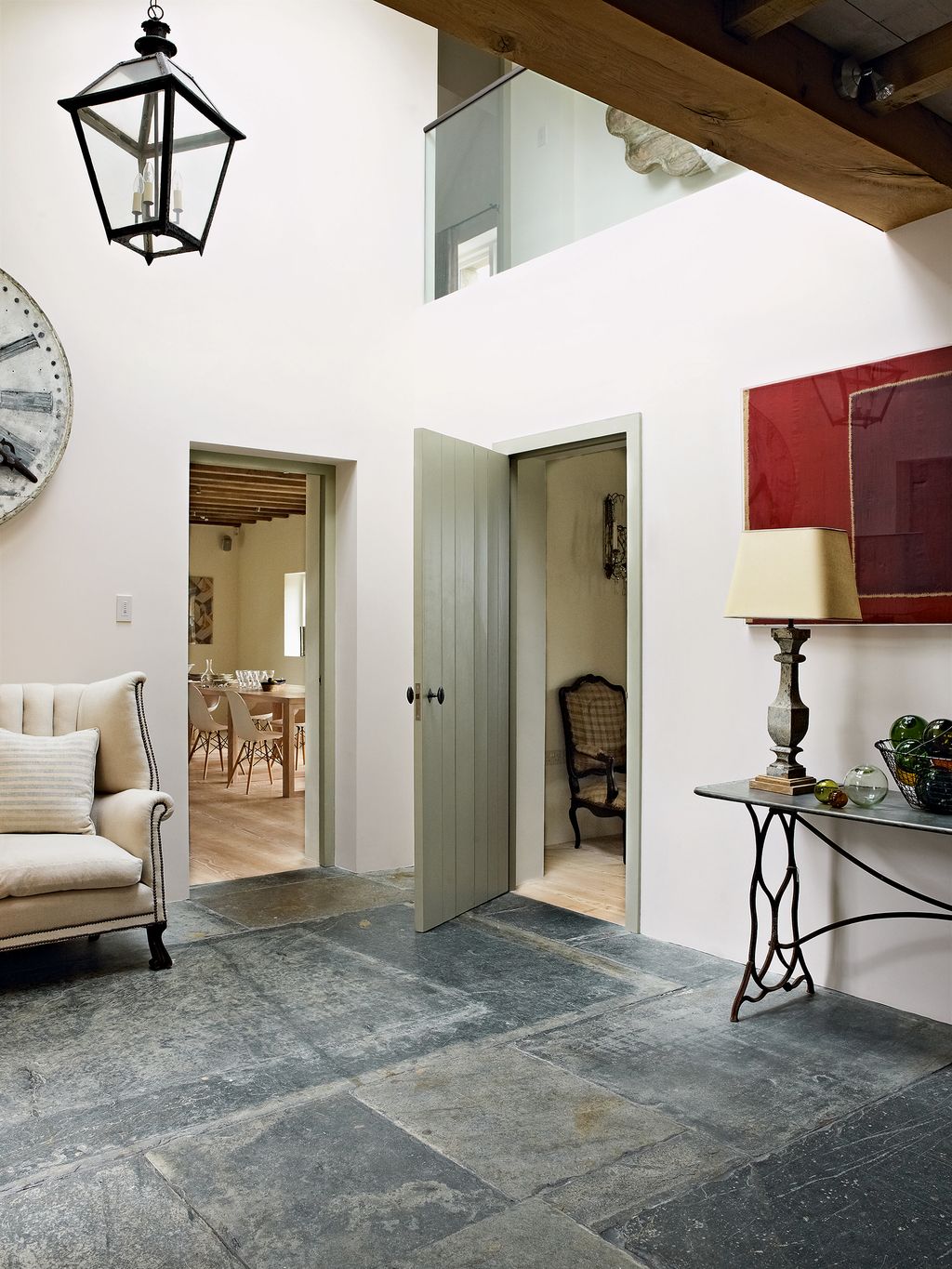 Image may contain Flooring Floor Corner Wood Living Room Room Indoors Interior Design Furniture and Hardwood