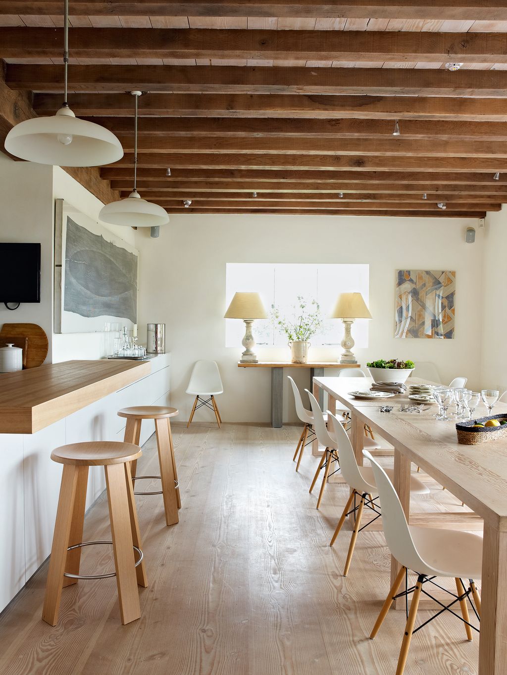 Image may contain Furniture Wood Interior Design Indoors Hardwood Chair Bar Stool Room Table Housing and Building