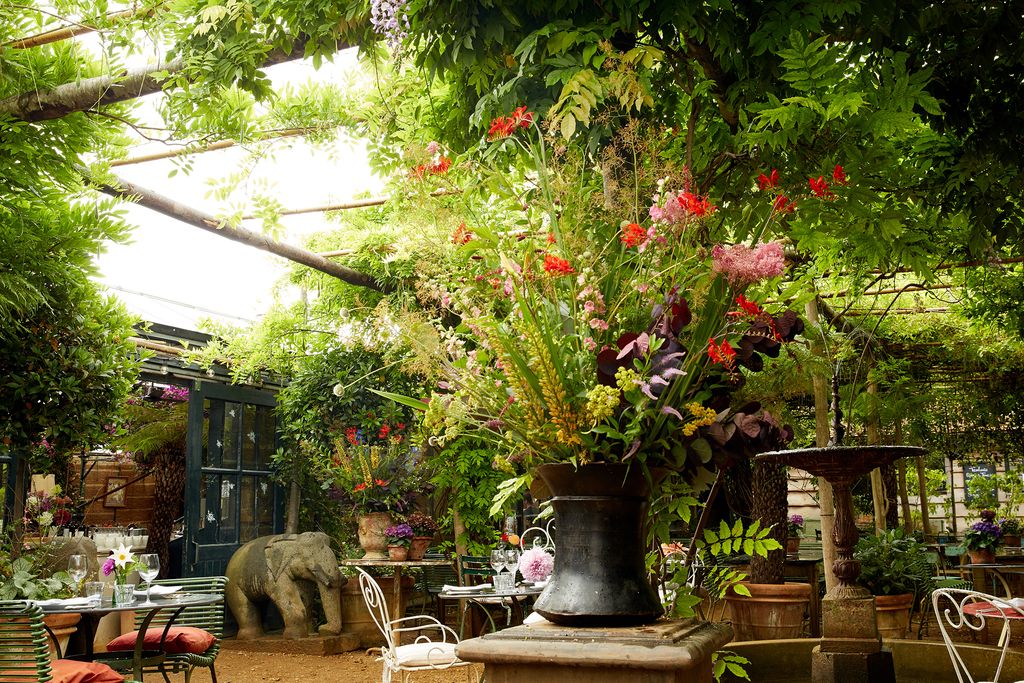 Image may contain Garden Arbour Outdoors Patio and Porch